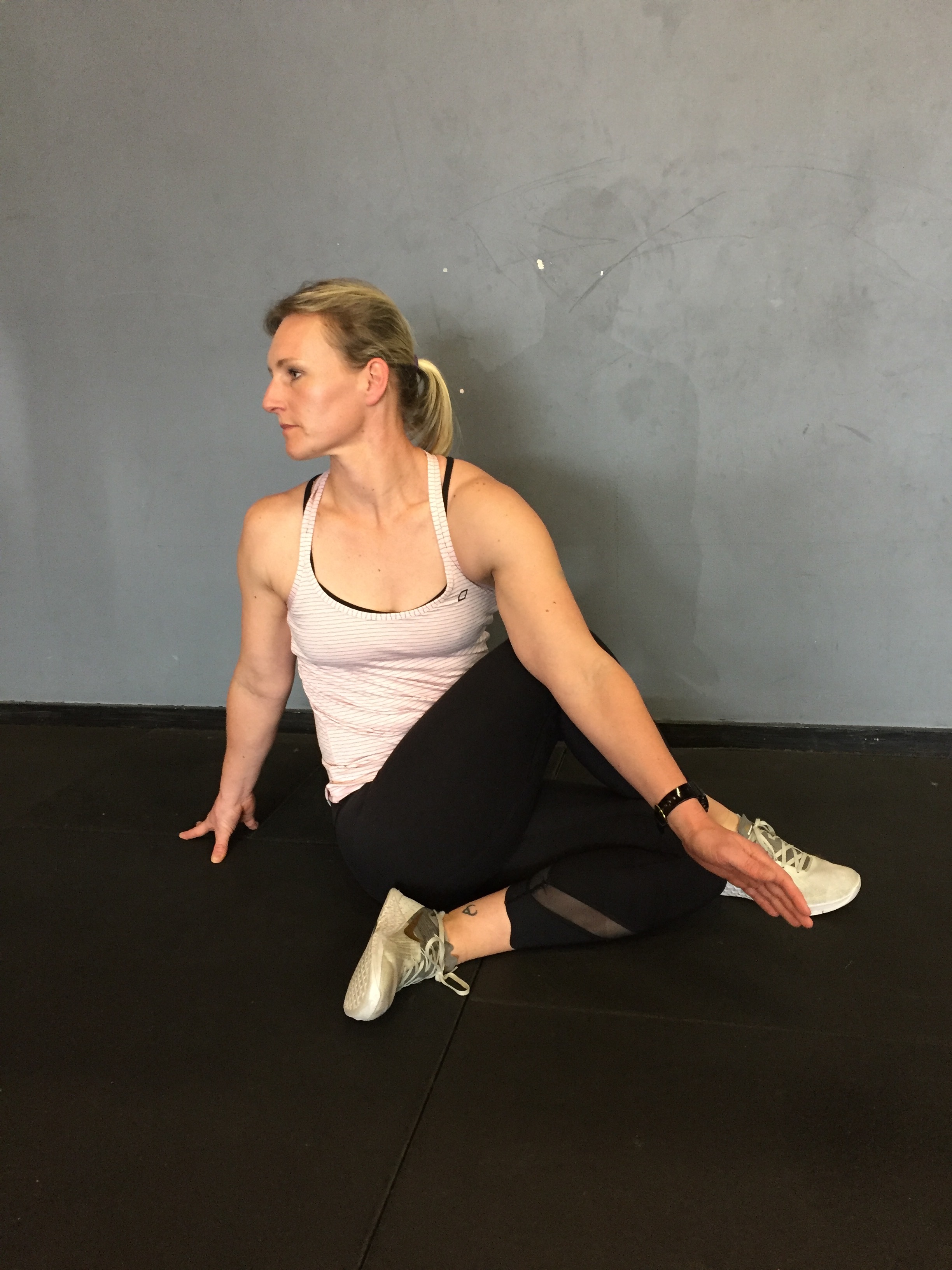 Seated T-spine rotation with both legs bent