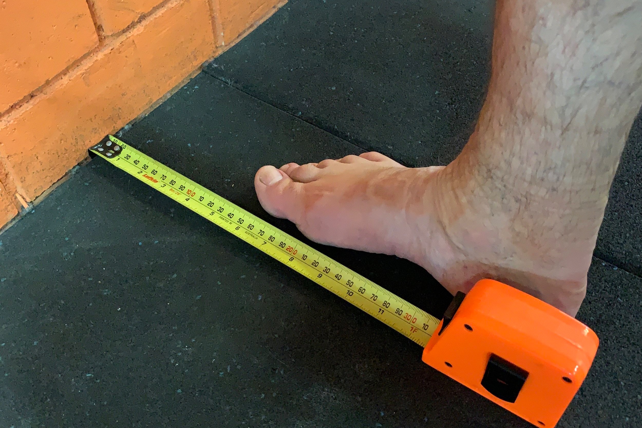 Place your foot with the big toe 13cm out from the wall